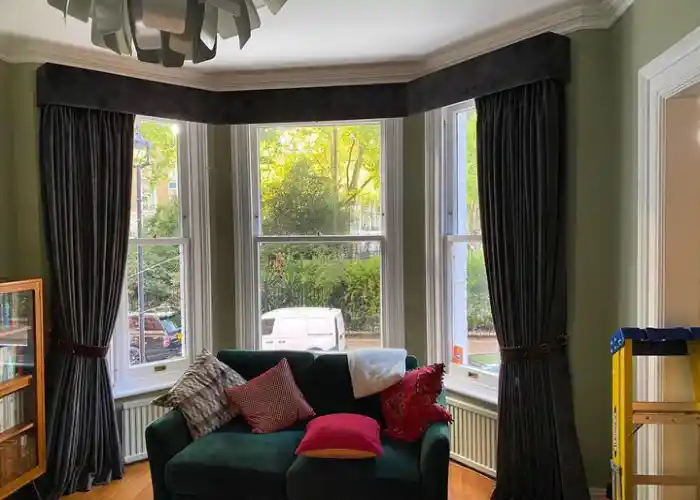 Room with blackout curtains drawn to enhance privacy