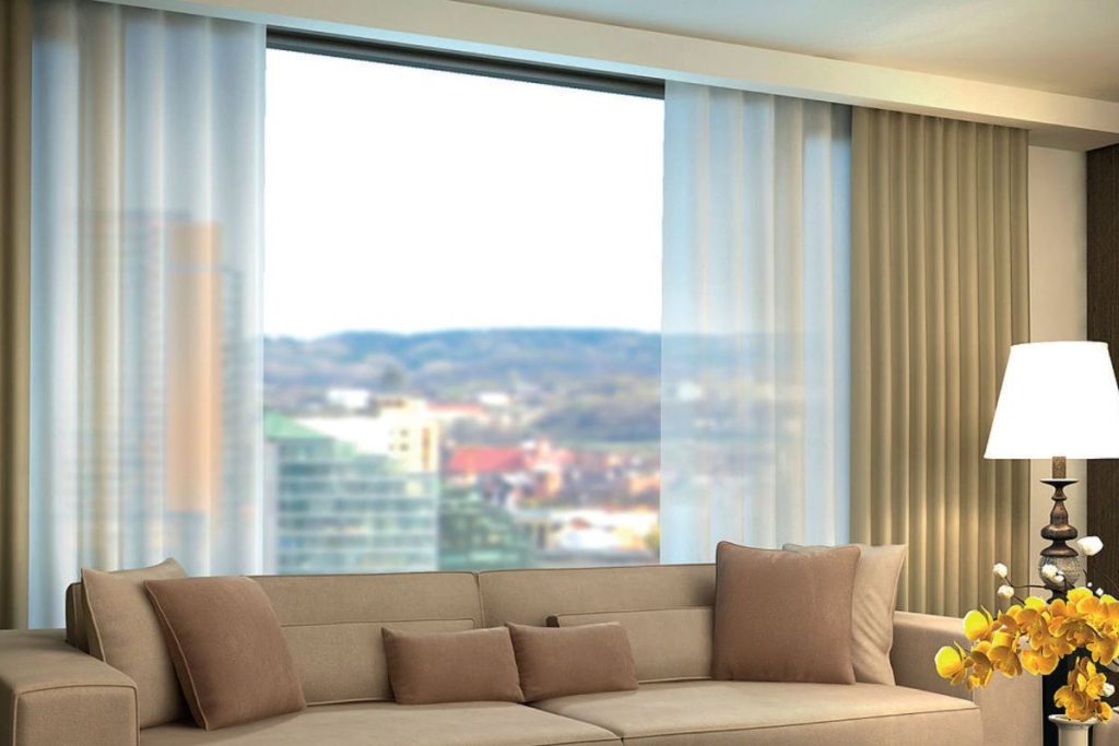 Custom motorized curtains tailored to fit large windows