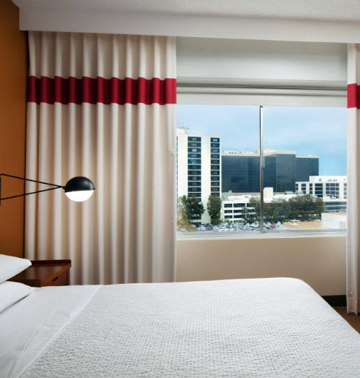 Modern hotel suite with white Linen curtains