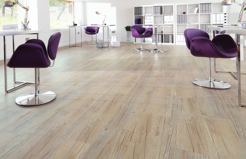 Modern office space with sleek Luxury Vinyl Tiles (LVT) flooring