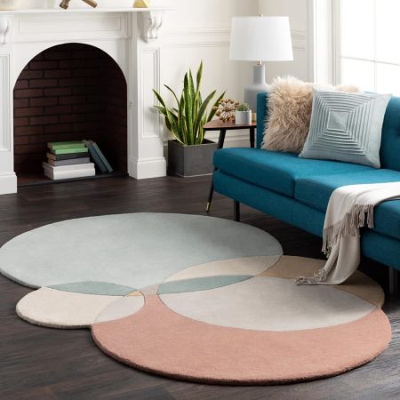 Bold and colorful round rug in a playful children's room