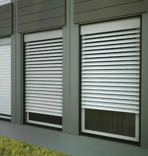 Classic wooden window shutters with a natural finish
