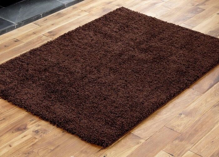 Cozy and soft brown shaggy rug, adding warmth and texture to any living space