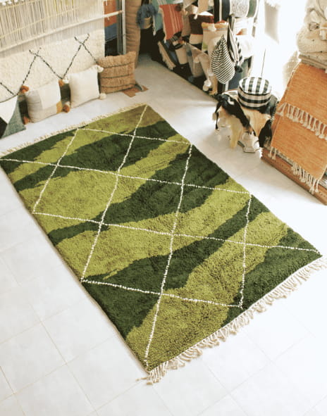 Vibrant geometric rug in earthy green tones